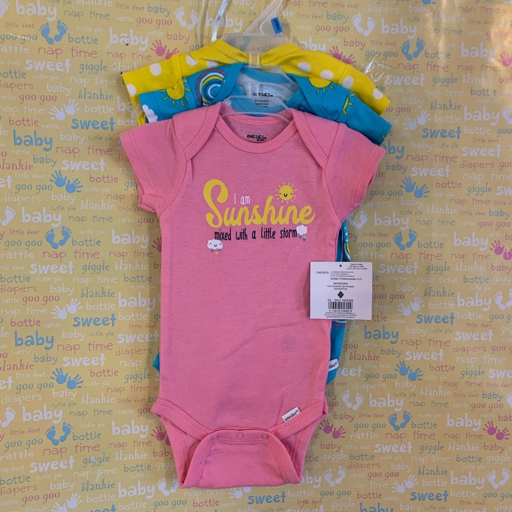 3 pieces onesie. little girl, 6 - 9 months. New